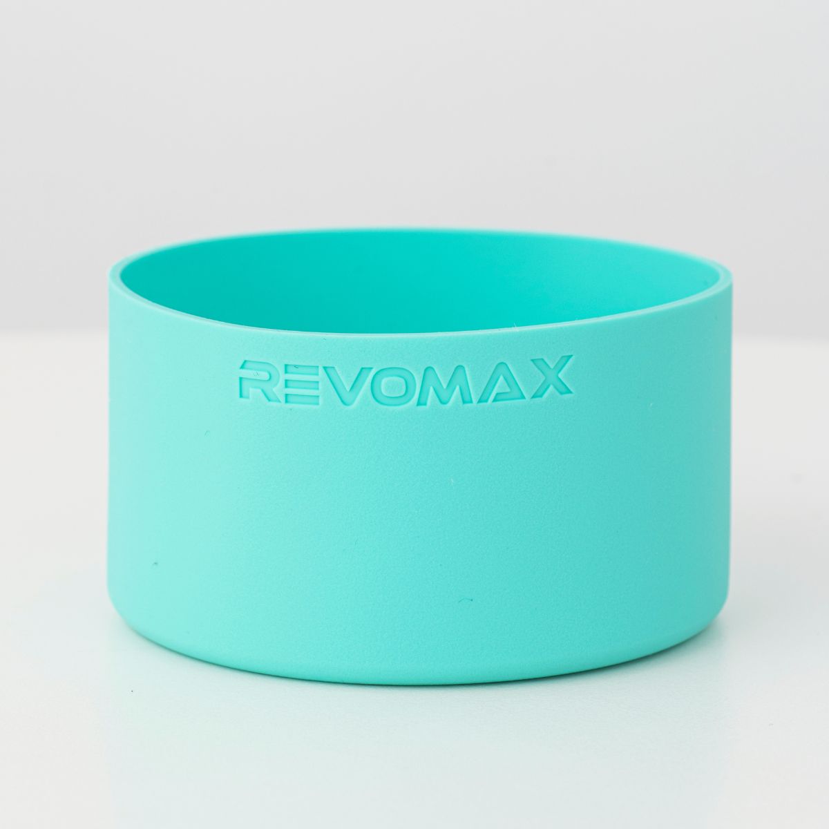 アメリカ、ポートランド発REVOMAX。最大の特長はワンプッシュ開閉可能で炭酸対応・ホット・アイス可で万能な水筒です。水筒の底につけるシリコンカバー・ターコイズブルーカラー